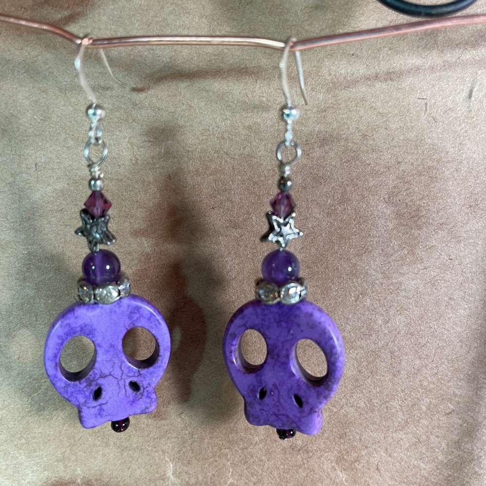 Purple skull earrings with genuine amethyst.